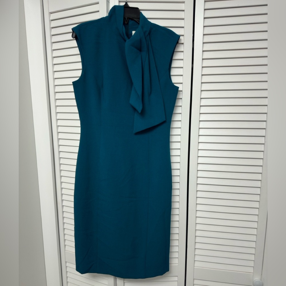 Like new Tie Neck Sheath Dress.